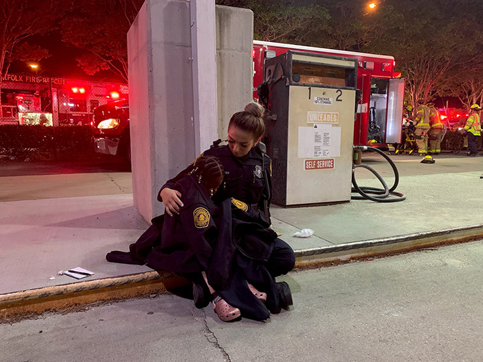 police officer comforts child after accident