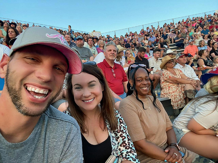 couple brings uber driver to concert