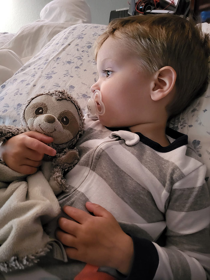 boy reunited with missing sloth