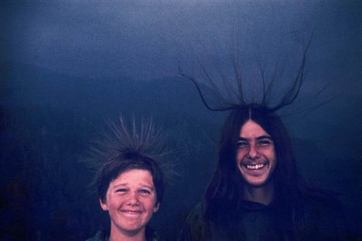 brothers hair standing up lightning strike