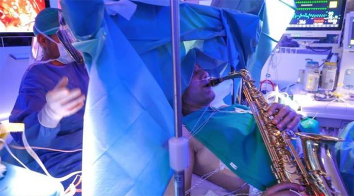 man plays sax during brain surgery