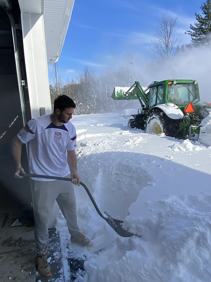 helping josh allen remove snow driveway