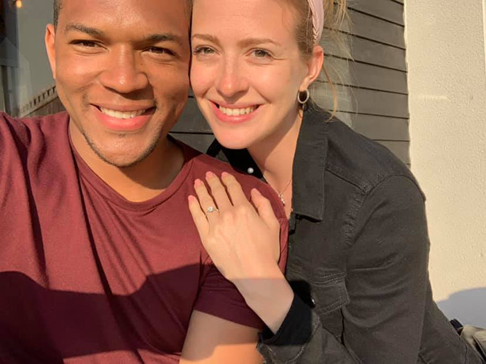 man photobombs girlfriend wedding ring a month