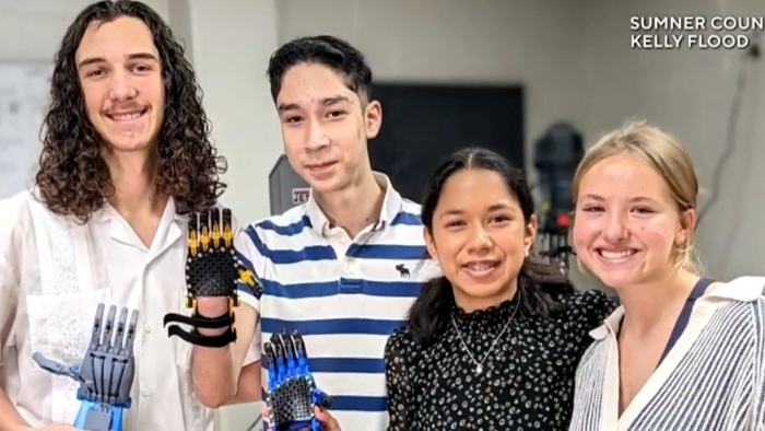 students build robotic hand for new classmate