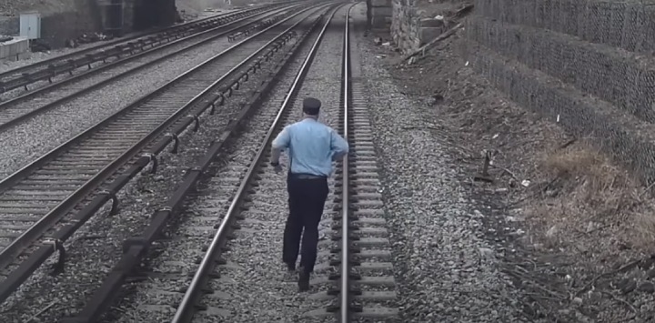 engineer saves kid on tracks