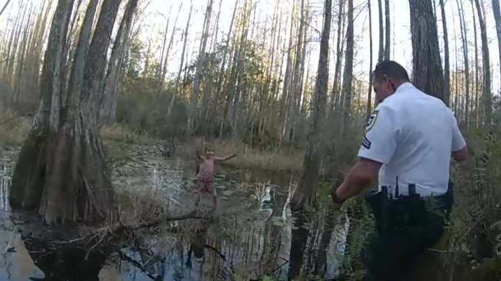 police rescue girl in swamp