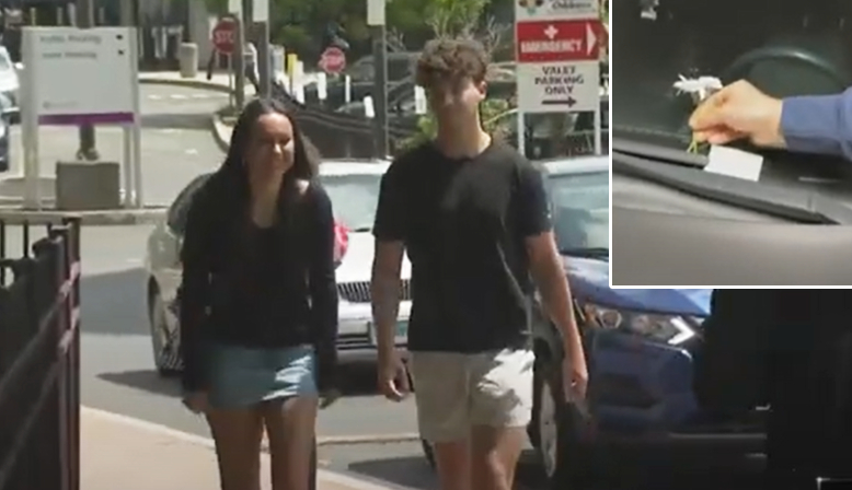 teens put flowers on cars at hospital