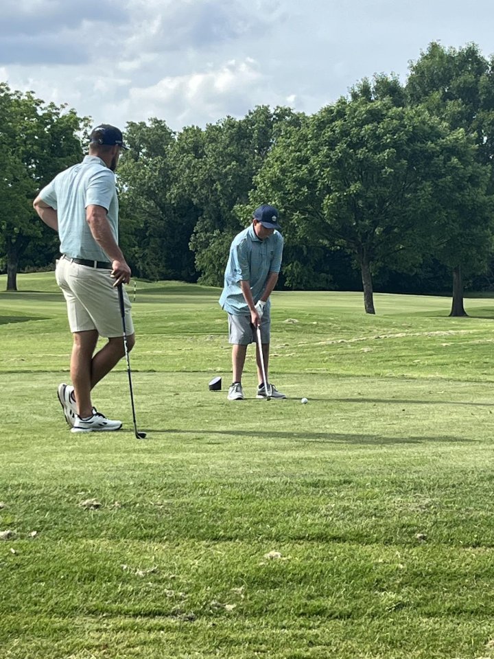 Bryson DeChambeau golfs with kid cancer