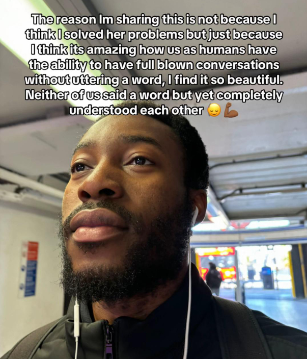 man shows kindness to woman crying on train