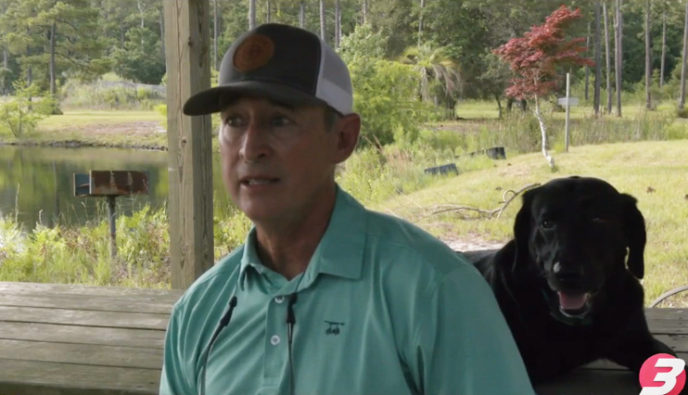 man saves dog from alligator