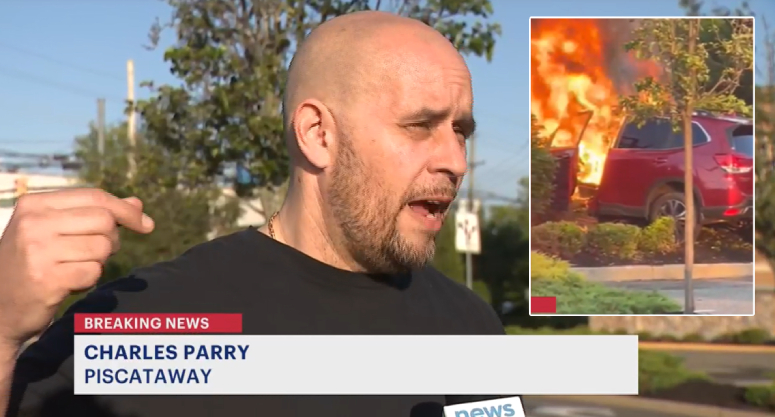 man rescues stranger from car on fire