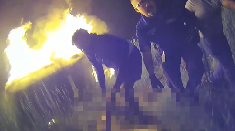 heroes save woman from car on fire