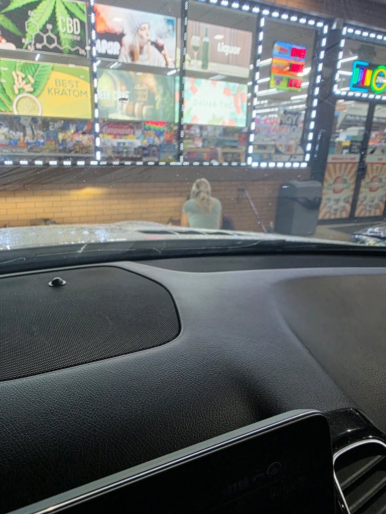 woman helps homeless man