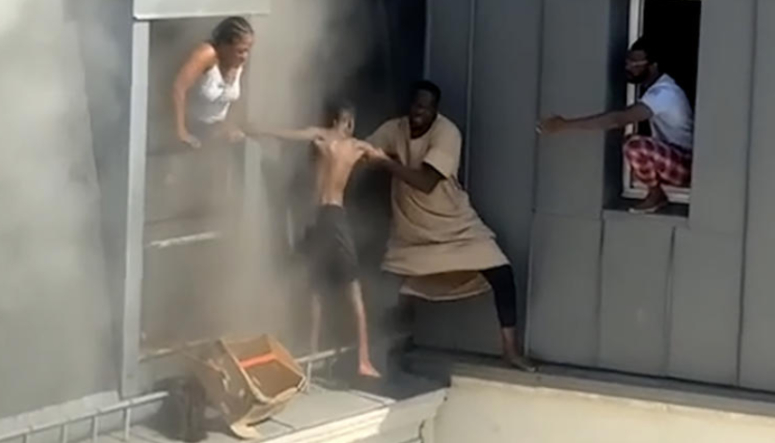 caretaker rescues family from fire in Paris