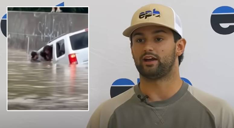 man saves woman flood car