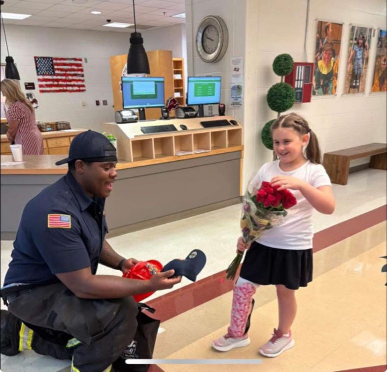 medic saves girl and visits her at school