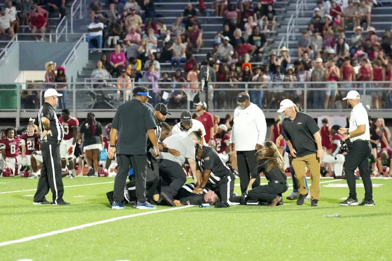 ref saves man at football game