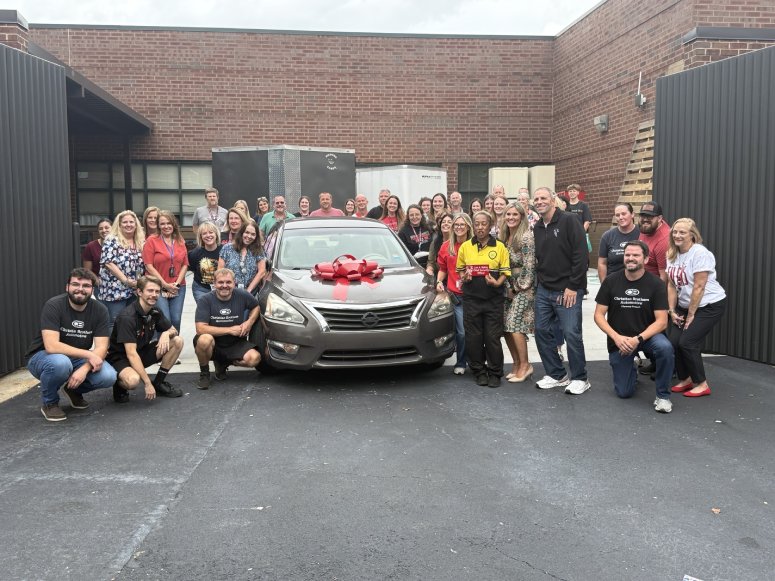 parking lot security guard gifted car from school
