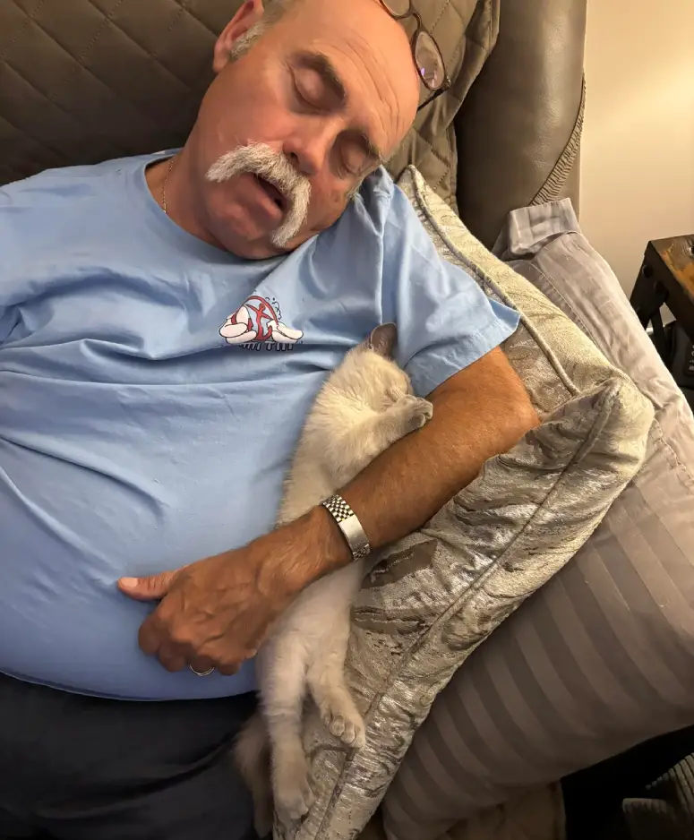 kitten and dad sleeping