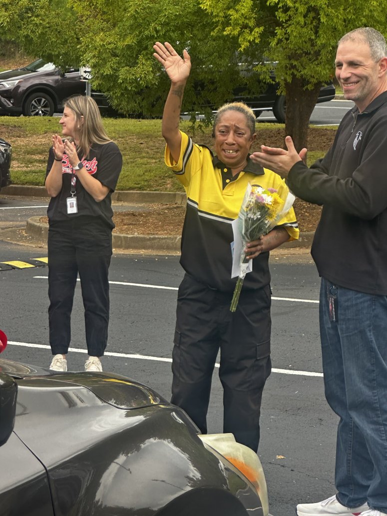 parking lot security guard gifted car from school
