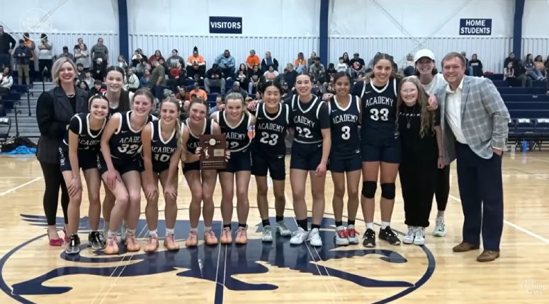 girls basketball team returns title news story