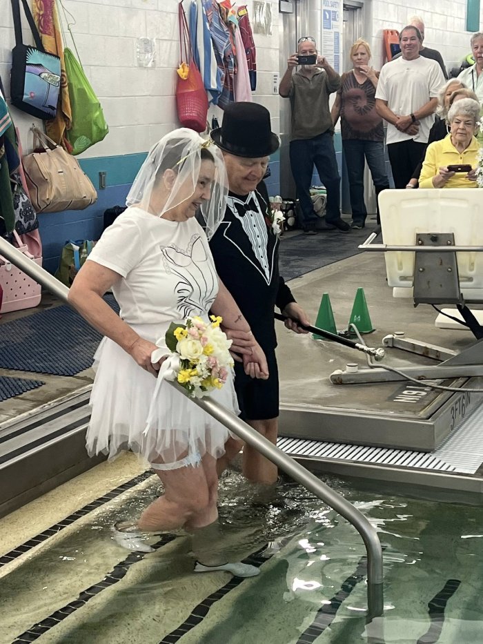 senior couple gets married in pool
