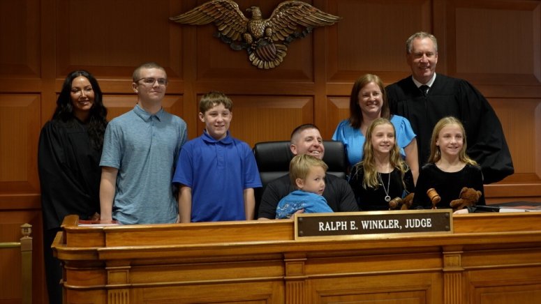 4 siblings adopted by couple