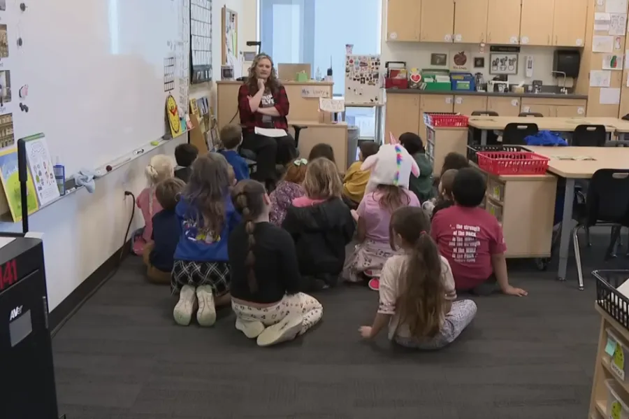 teacher makes custom hats for kids